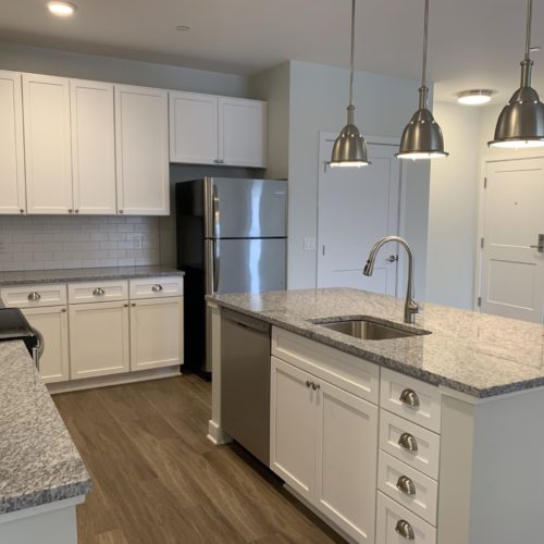 Harbor Heights White Kitchen with stainless steel appliances